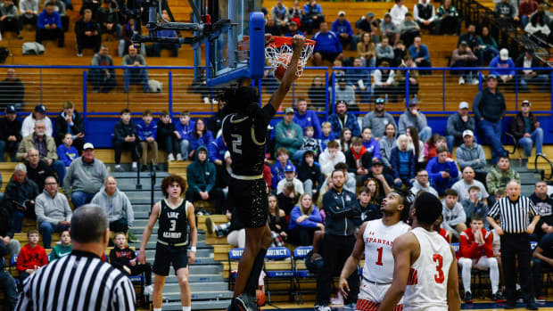 Link Academy's Jasper Johnson throws down a dunk